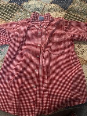 Remember Nguyen red checked shirt